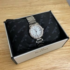 BRAND NEW women’s diamond-crusted Bulova watch